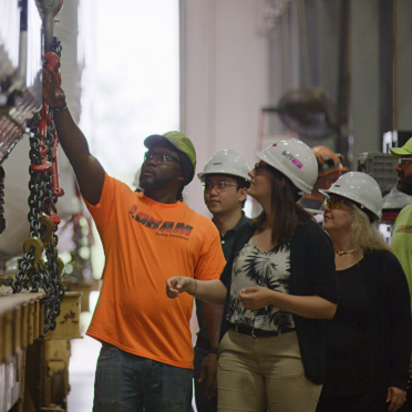 Group of people checking equipment